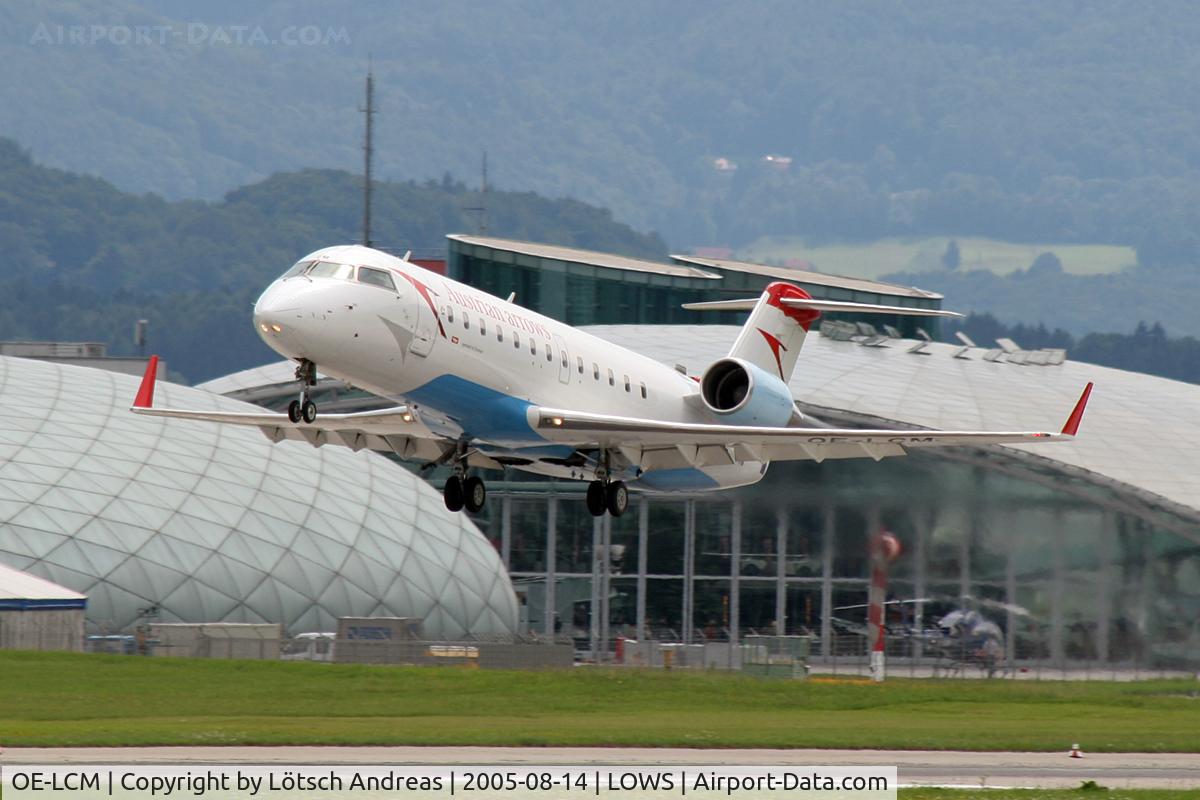 OE-LCM, 1997 Canadair CRJ-200LR (CL-600-2B19) C/N 7205, Hangar 7 at background