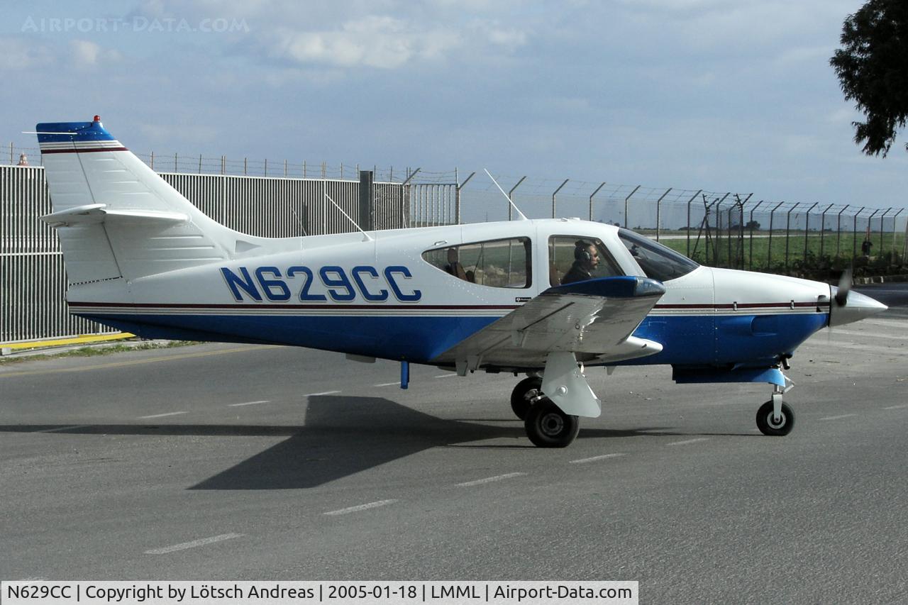 N629CC, 1977 Rockwell International 112B Commander C/N 544, crossing a street