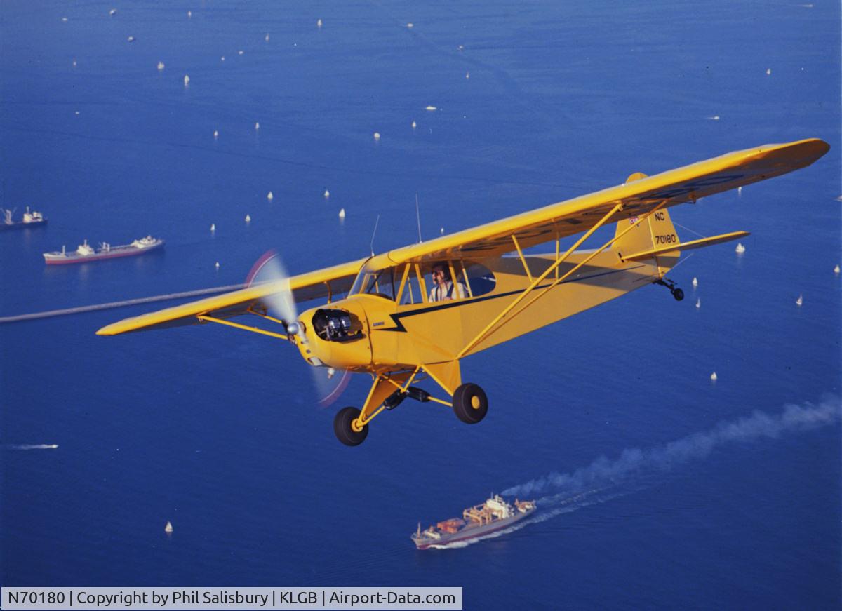 N70180, 1946 Piper J3C-65 Cub C/N 17165, Taken over Long Beach Harbor, CA in 1974