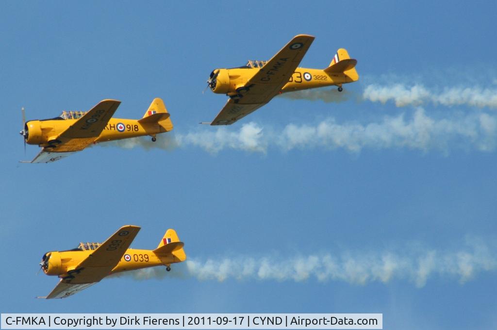 C-FMKA, 1941 Noorduyn AT-16 Harvard II C/N 75-3496, A aerial demonstration of formation flying at this year's Wings of Canada Airshow.