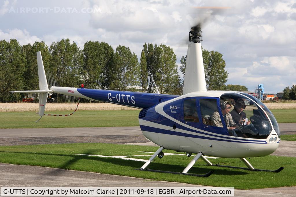 G-UTTS, 2000 Robinson R44 C/N 0865, Robinson R44 at Breighton Airfield's Helicopter Fly-In, September 2011.