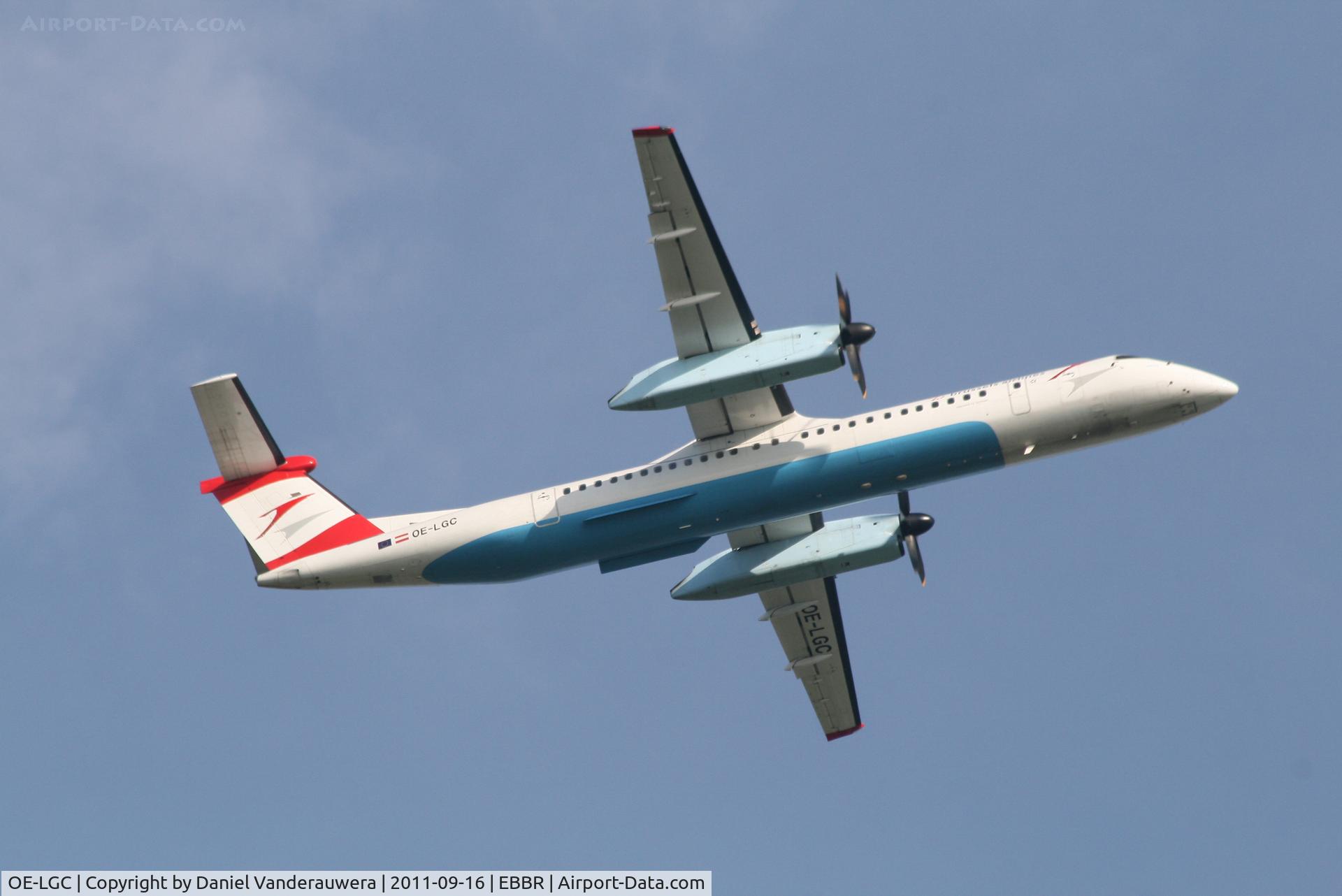 OE-LGC, 2000 De Havilland Canada DHC-8-402Q Dash 8 C/N 4026, Flight SN2633 is climbing from RWY 07R