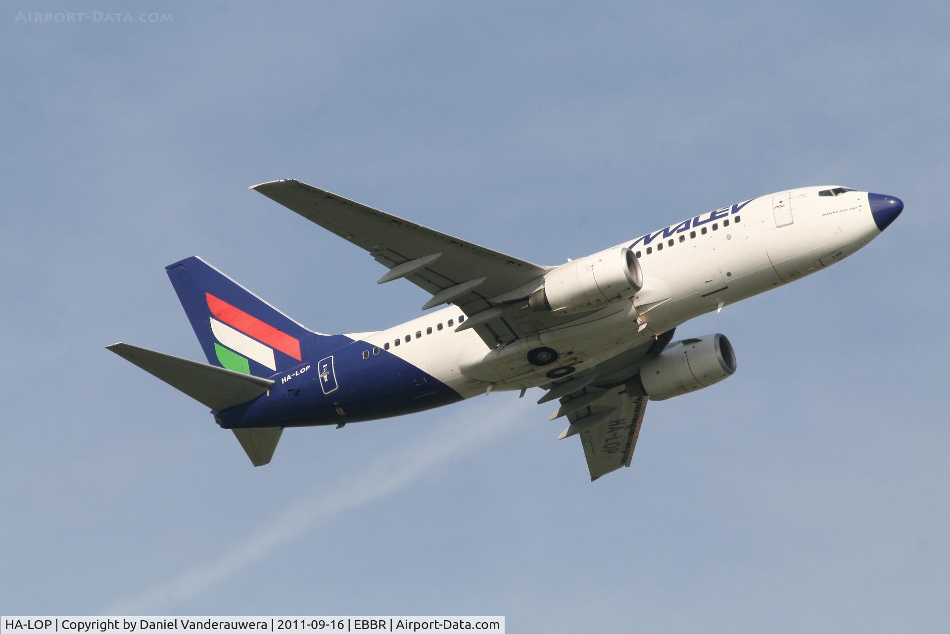 HA-LOP, 2004 Boeing 737-7Q8 C/N 29354, Flight MA601 is climbing from RWY 07R