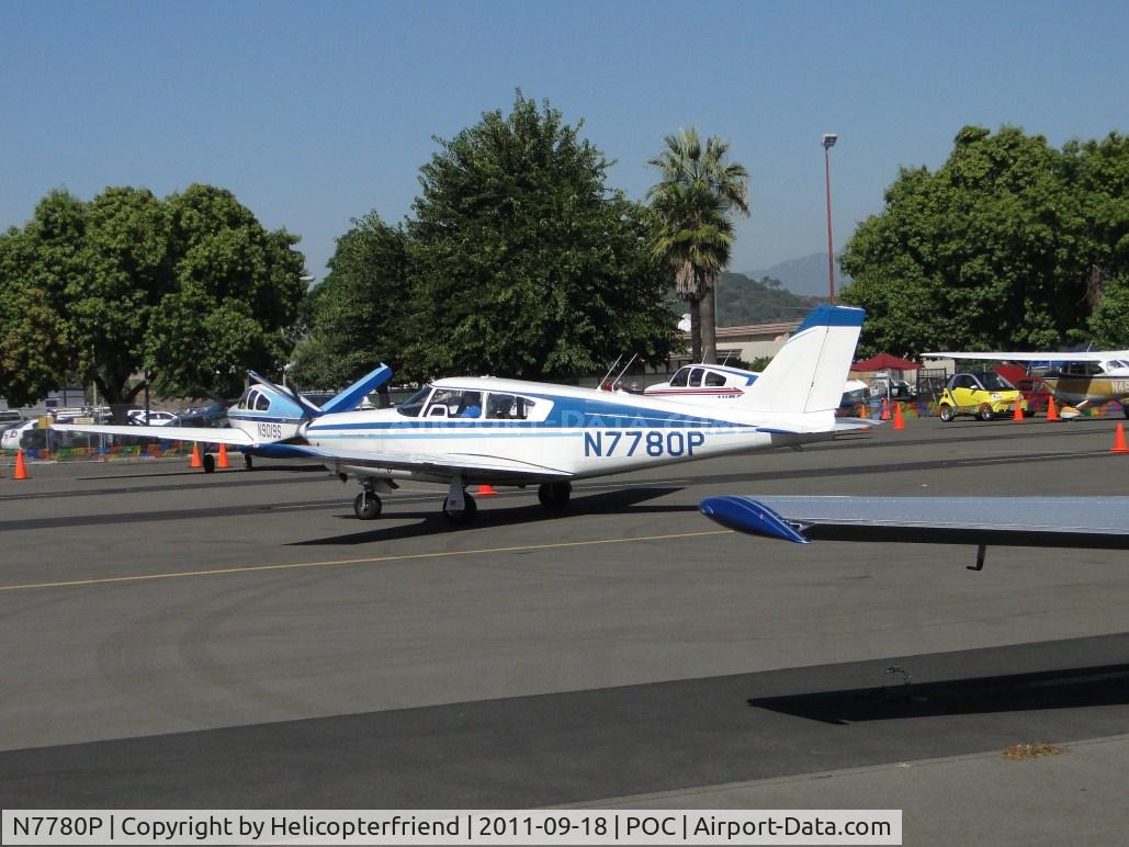 N7780P, 1961 Piper PA-24-250 Comanche C/N 24-2997, Being directed into static display area