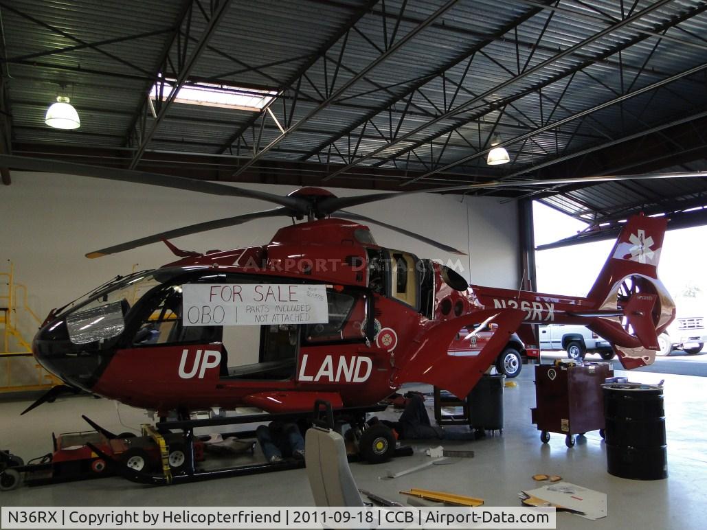 N36RX, Eurocopter EC-135P-2+ C/N 0859, Appear to be having fun putting bird together