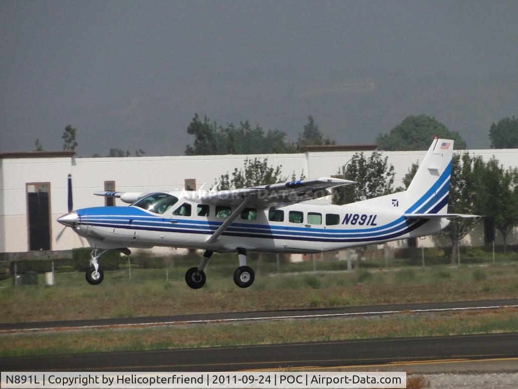 N891L, 2002 Cessna 208B Grand Caravan C/N 208B0938, Lifting off runway 26L before taxiway Cocco