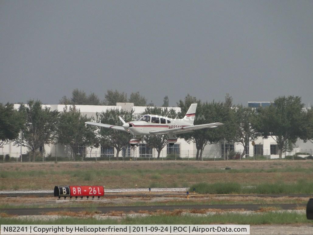 N82241, 1982 Piper PA-28-181 C/N 28-8390018, Over the threshold on runway 26L