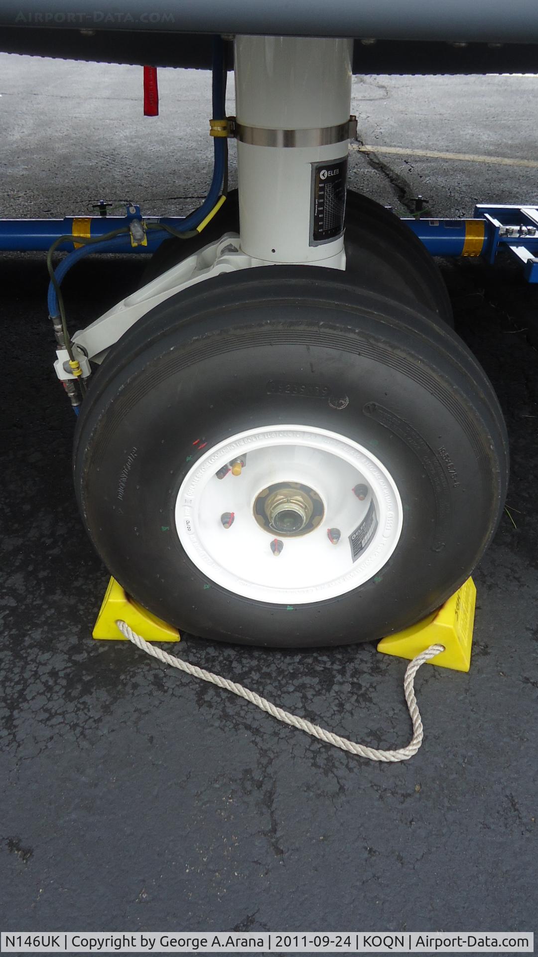 N146UK, 2011 Sikorsky S-92A C/N 92-0146, Starboard main landing gear, brake hoses and chocks