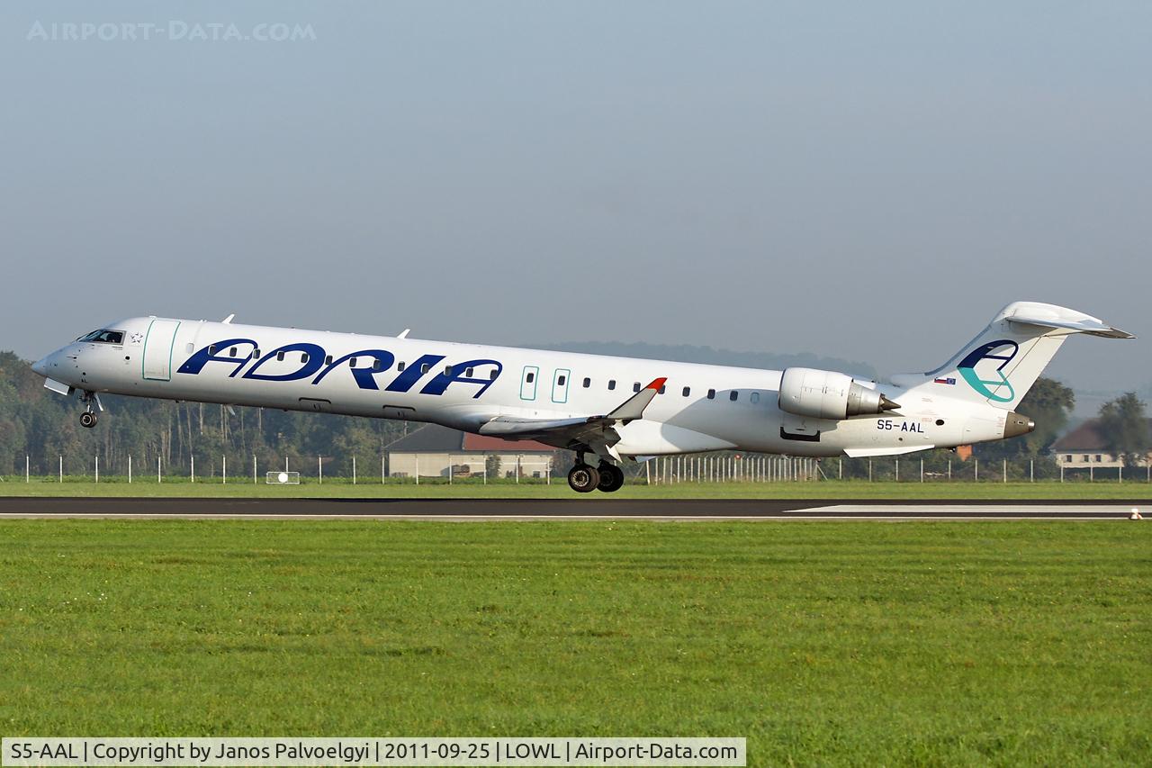 S5-AAL, 2007 Bombardier CRJ-900LR (CL-600-2D24) C/N 15129, Canadair CL-600-2D24 Regional Jet CRJ-900 landing in LOWL