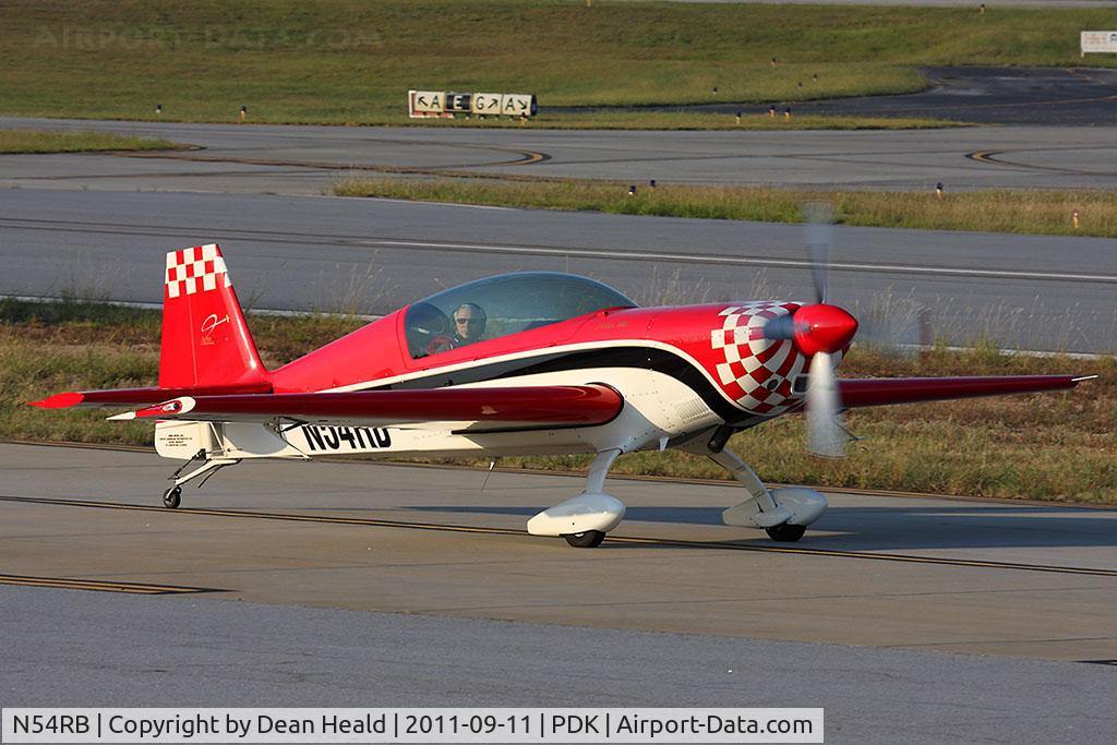 N54RB, 2000 Extra EA-300/L C/N 128, N54RB taxiing to RWY 2L for takeoff.