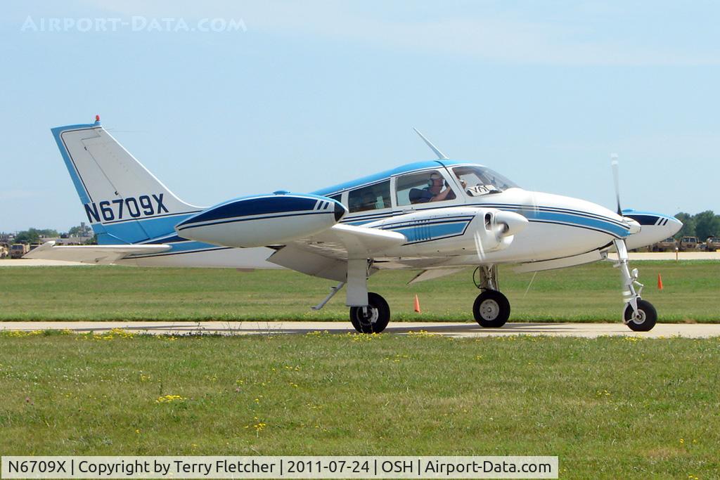 N6709X, 1960 Cessna 310F C/N 310-0009, At 2011 Oshkosh