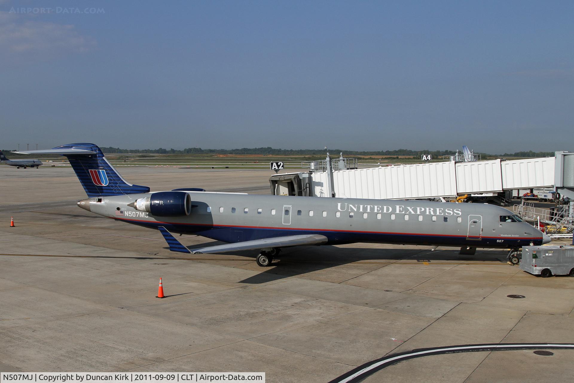 N507MJ, 2003 Bombardier CRJ-701 (CL-600-2C10) Regional Jet C/N 10017, Still wearing the grey colors