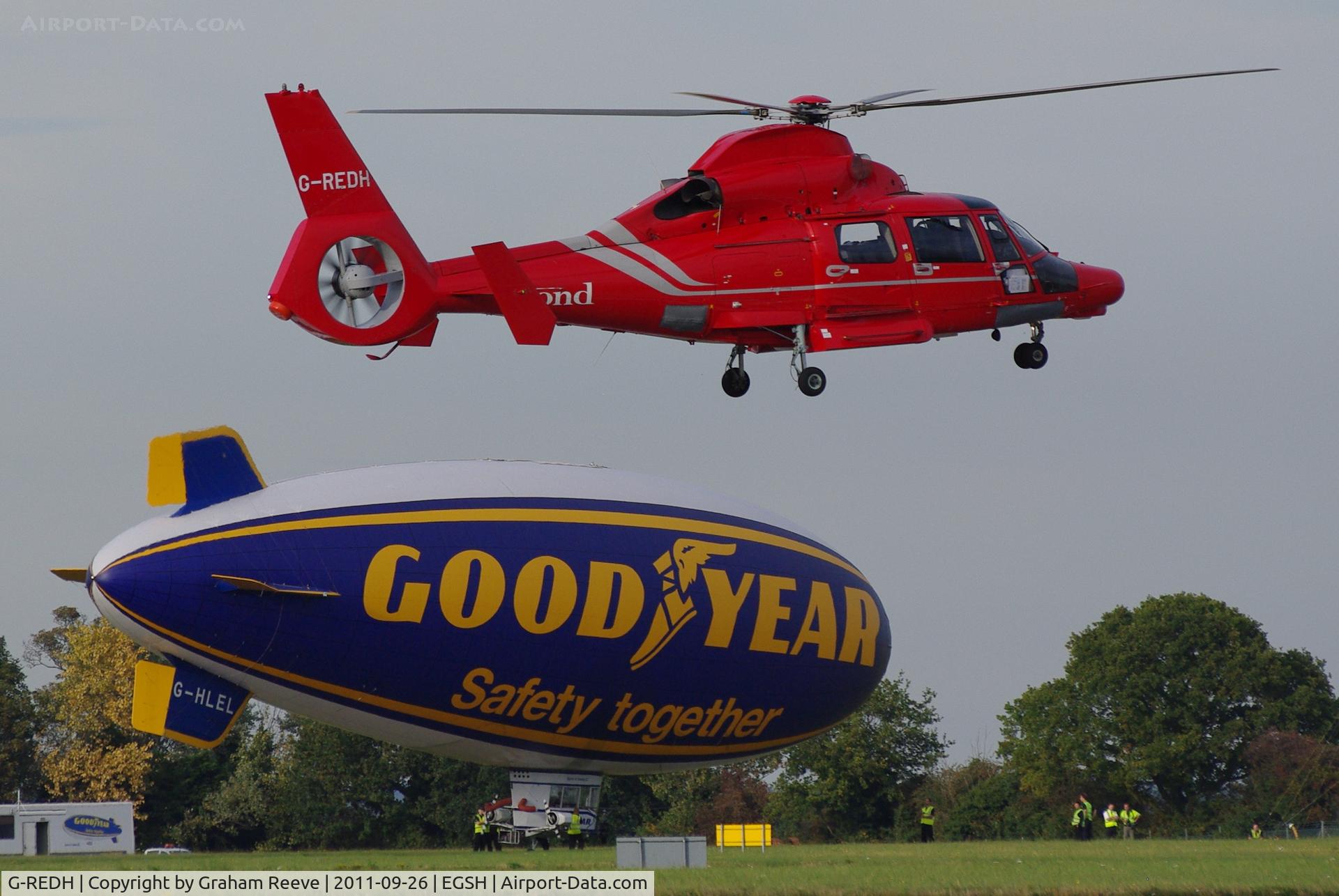 G-REDH, 2010 Eurocopter AS-365N-3 Dauphin 2 C/N 6911, Landing with G-HLEL in the back ground.