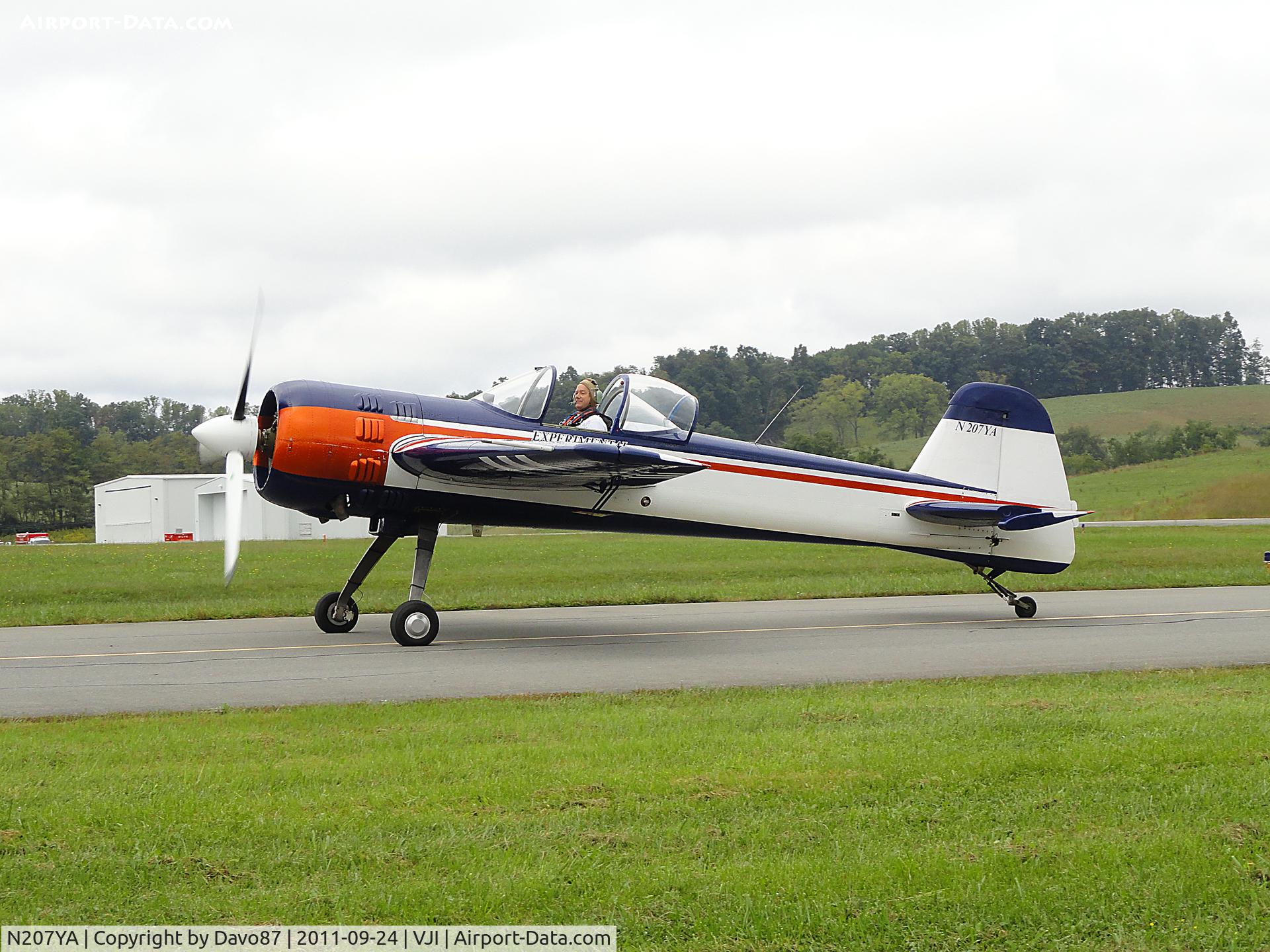 N207YA, 1966 Yakovlev Yak-55M C/N 961010, Yak performing at the 2011 Abingdon, Virginia Kiwanis Club Wings and Wheels Show.