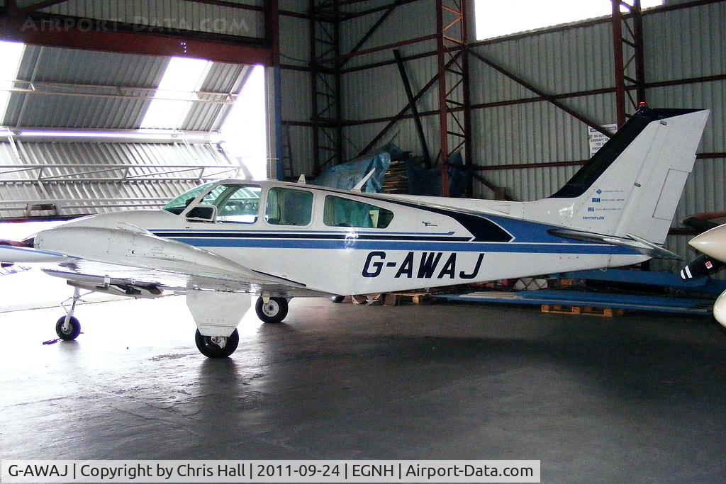 G-AWAJ, 1968 Beech D55 Baron C/N TE-536, inside the packed Blackpool Air Centre hangar