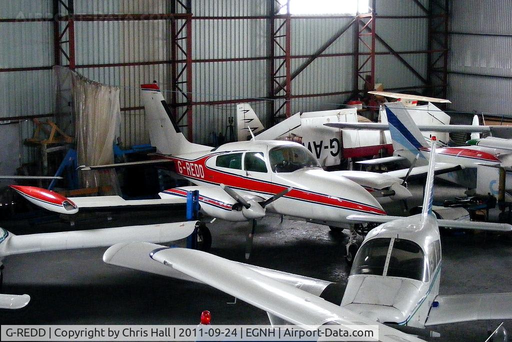 G-REDD, 1980 Cessna 310R C/N 310R-1833, inside the packed Blackpool Air Centre hangar