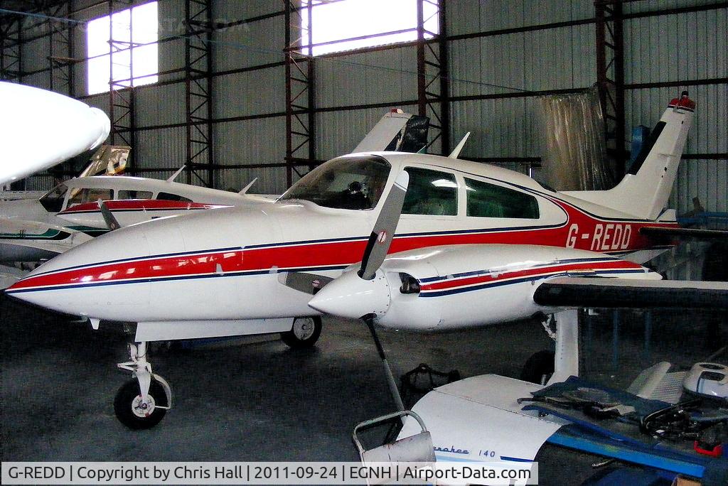 G-REDD, 1980 Cessna 310R C/N 310R-1833, inside the packed Blackpool Air Centre hangar