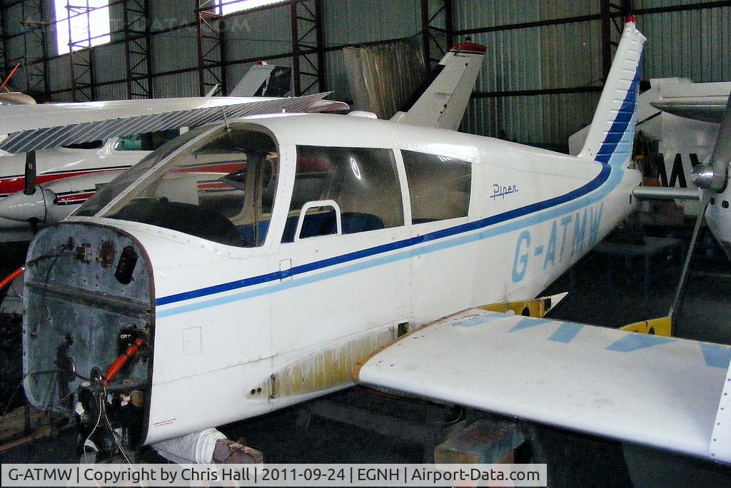 G-ATMW, 1966 Piper PA-28-140 Cherokee C/N 28-21486, inside the packed Blackpool Air Centre hangar