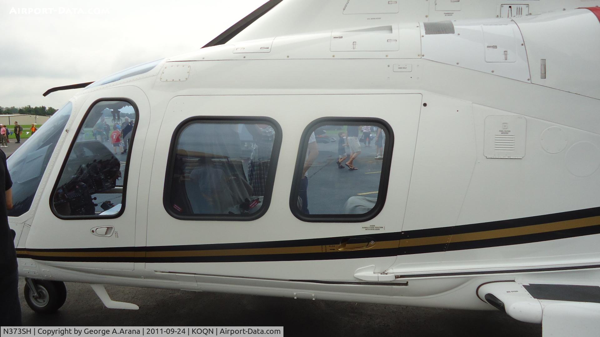N373SH, Agusta A-109S C/N 22010, Port side glass
