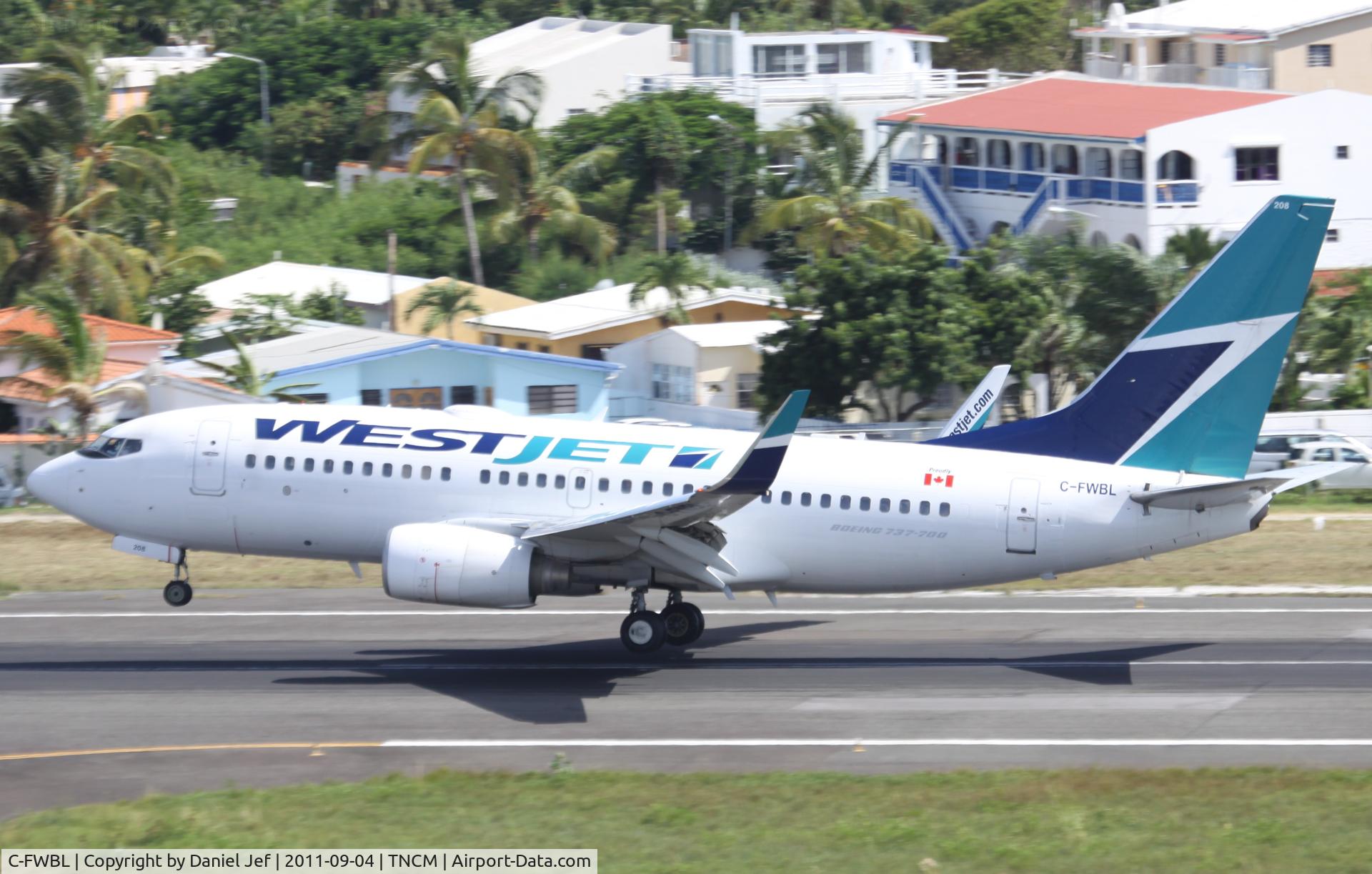 C-FWBL, 2003 Boeing 737-7CT C/N 32750, Canjet landing at TNCM