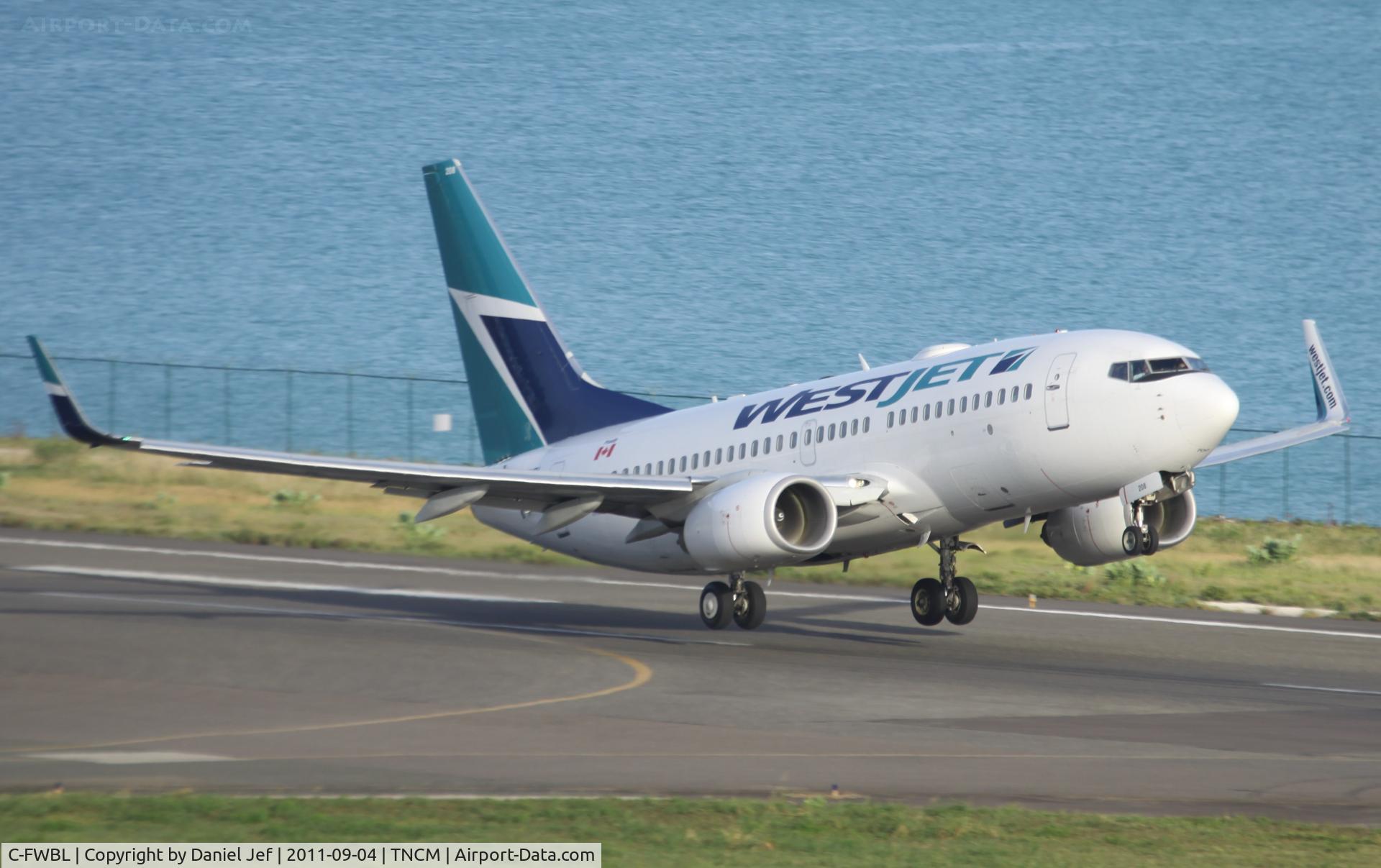 C-FWBL, 2003 Boeing 737-7CT C/N 32750, CanJet departing TNCM runway 28