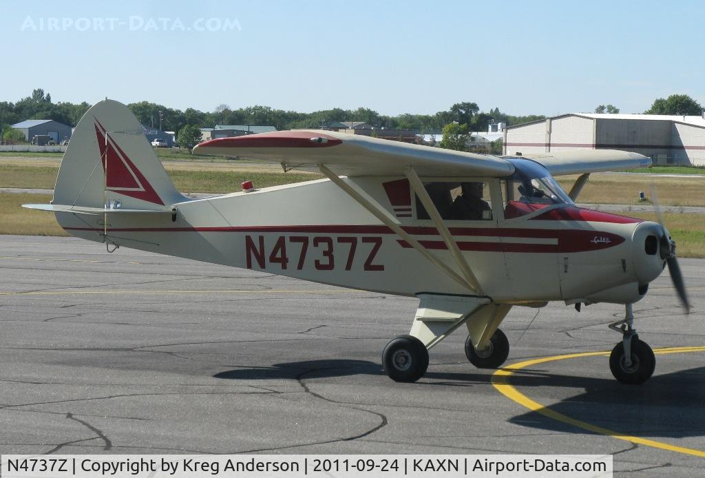N4737Z, 1961 Piper PA-22-108 Colt C/N 22-8288, Piper PA-22-108 Colt taxiing to the fuel pump.