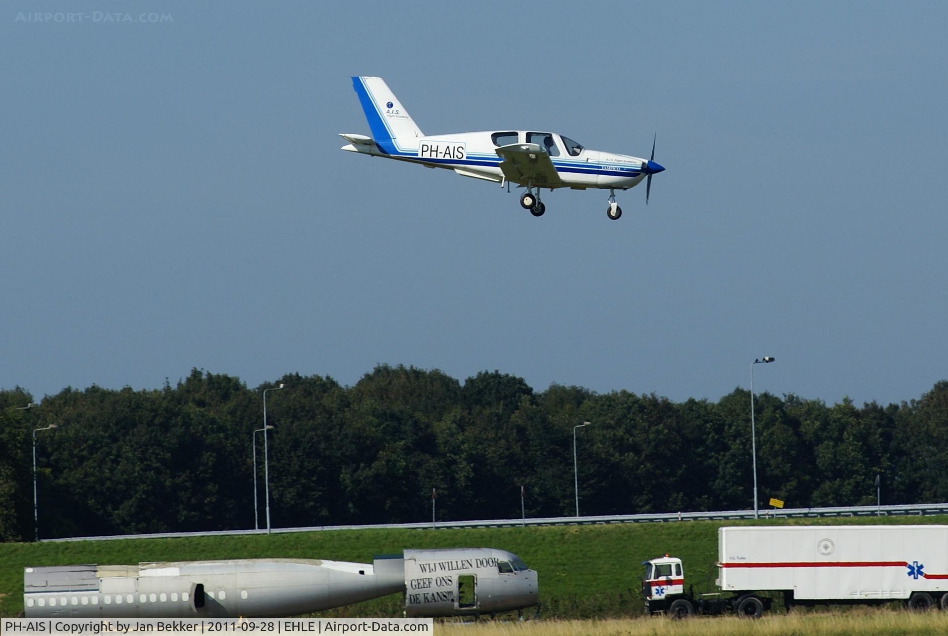PH-AIS, 1991 Socata TB-9 Tampico C/N 1260, Just before landing at Lelystad Airport