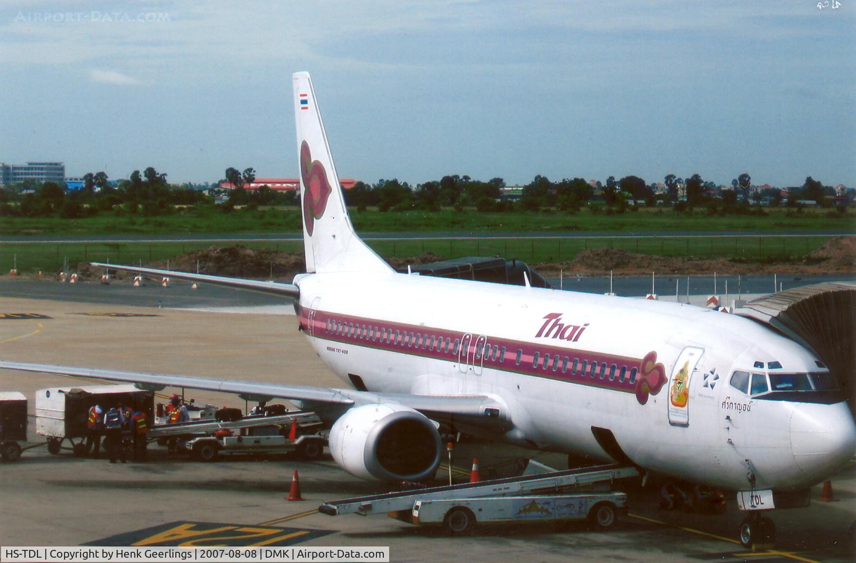 HS-TDL, 1997 Boeing 737-4D7 C/N 28702, Thai , Spcl logo on the door: The 60th anniversary celebration of his majesty Accession.
