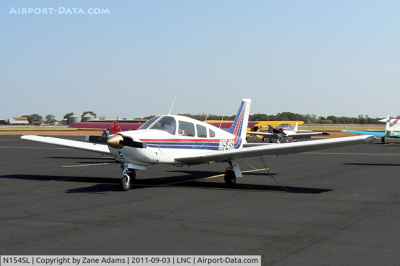 N154SL, 1977 Piper PA-28R-201 Cherokee Arrow III C/N 28R-7737154, At the 2011 Warbirds on Parade Fly-in at Lancaster Airport, TX