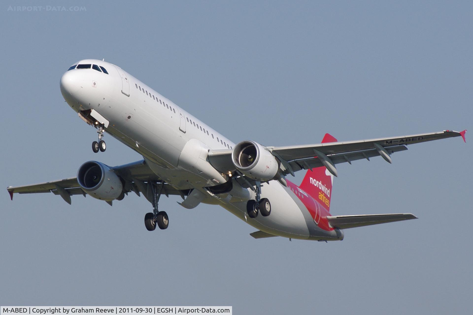 M-ABED, 2000 Airbus A321-211 C/N 1219, Freshly painted and departing from Norwich.