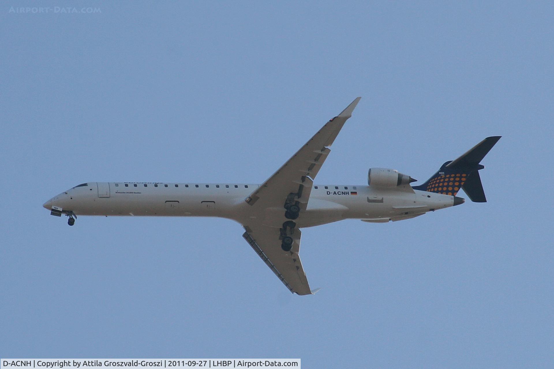 D-ACNH, 2009 Bombardier CRJ-900 NG (CL-600-2D24) C/N 15247, Getting off direction Budapest Liszt Ferenc onto an International Airport, in Üllö city