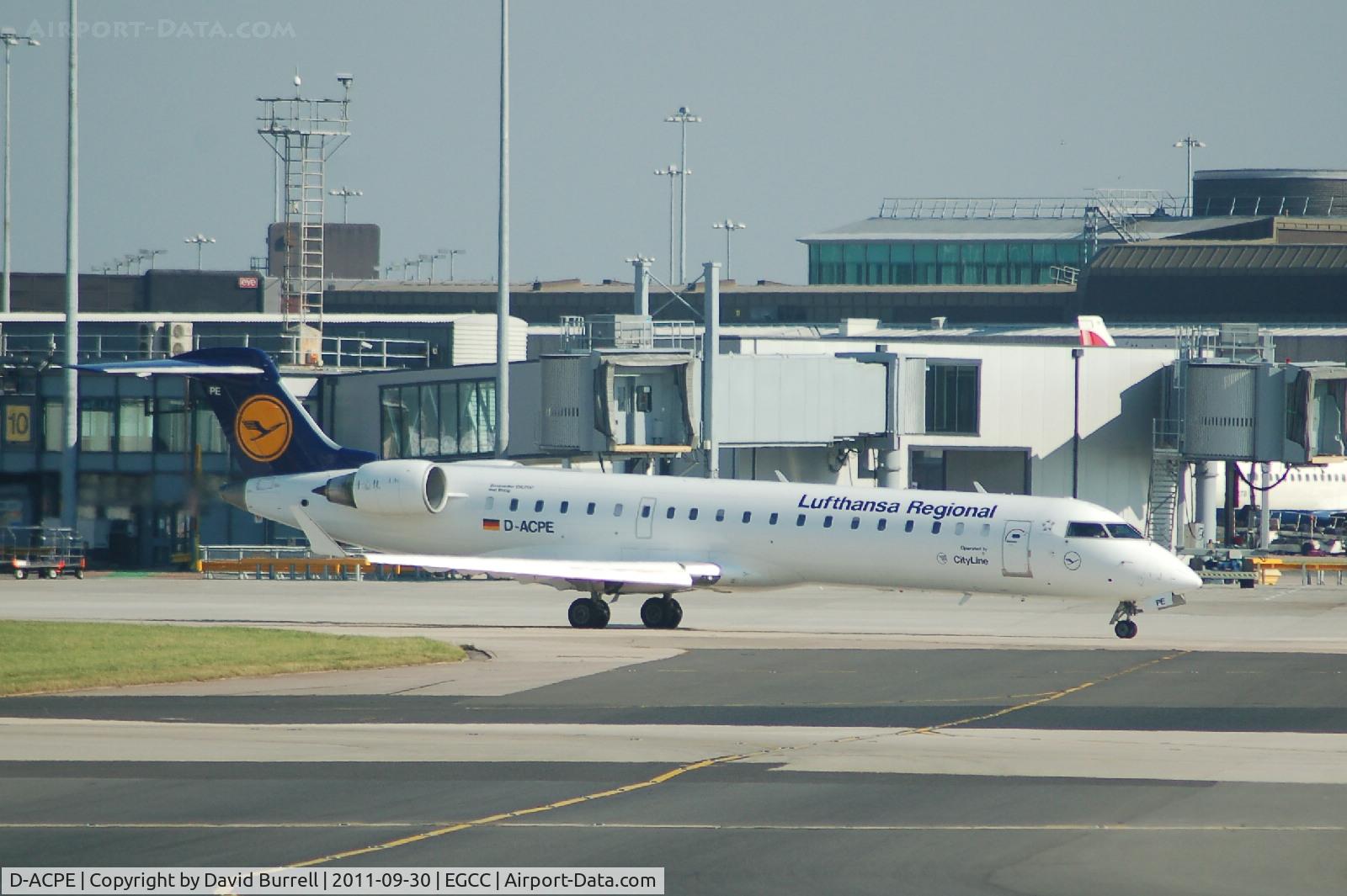 D-ACPE, 2001 Bombardier CRJ-701ER (CL-600-2C10) Regional Jet C/N 10027, Lufthansa Regional Canadair RJ700 Taxiing at Manchester Airport.