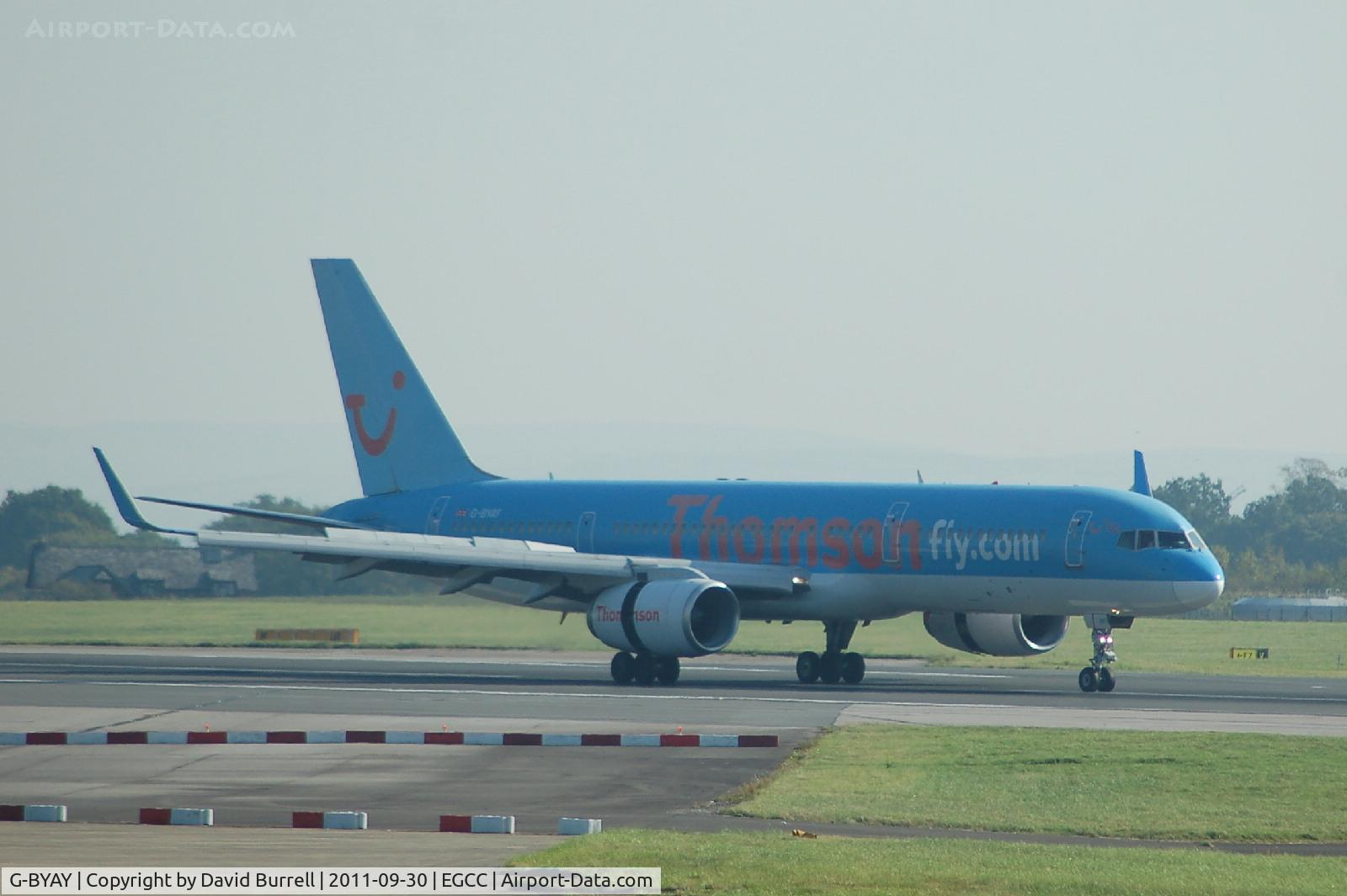 G-BYAY, 1999 Boeing 757-204 C/N 28836, Thomson Boeing 757 landed at Manchester Airport.