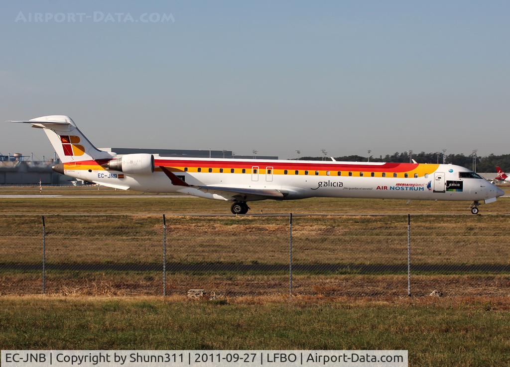 EC-JNB, 2005 Bombardier CRJ-900 (CL-600-2D24) C/N 15057, Taxiing holding point rwy 14R for departure... Additional 'Galicia' patch and titles now...