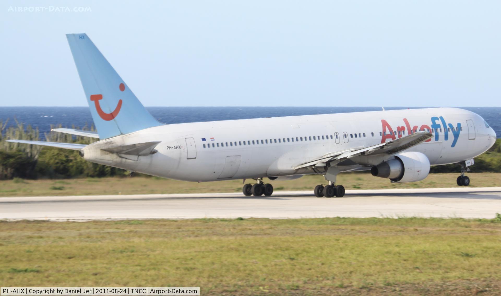 PH-AHX, 1990 Boeing 767-383 C/N 24847, PH-AXK taking off at TNCC