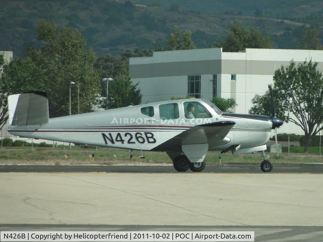 N426B, 1957 Beech A35 Bonanza C/N D-1647, Taxiing eastbound on taxiway Sierra for runway 26L