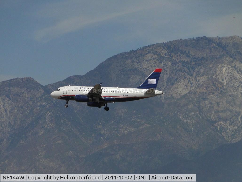 N814AW, 2000 Airbus A319-132 C/N 1281, On final to runway 26R