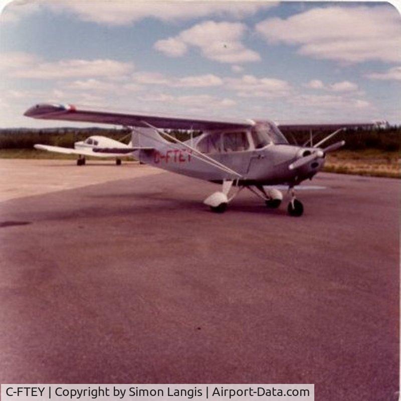 C-FTEY, 1958 Champion 7FC C/N 181, Photo taken at Forestville, Quebec, Canada in 1979. Was owner at the time. Flew 600 hours in it.