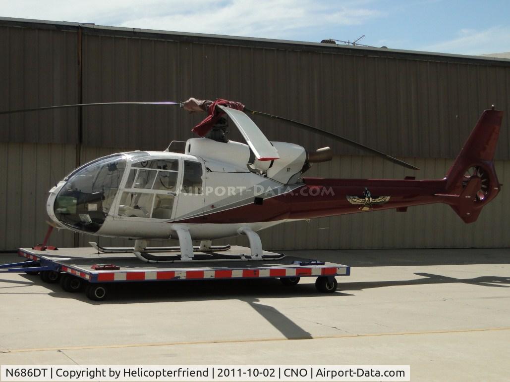 N686DT, 1974 Aérospatiale SA-341G Gazelle C/N 1200, Parked on transport dolley next to hangers