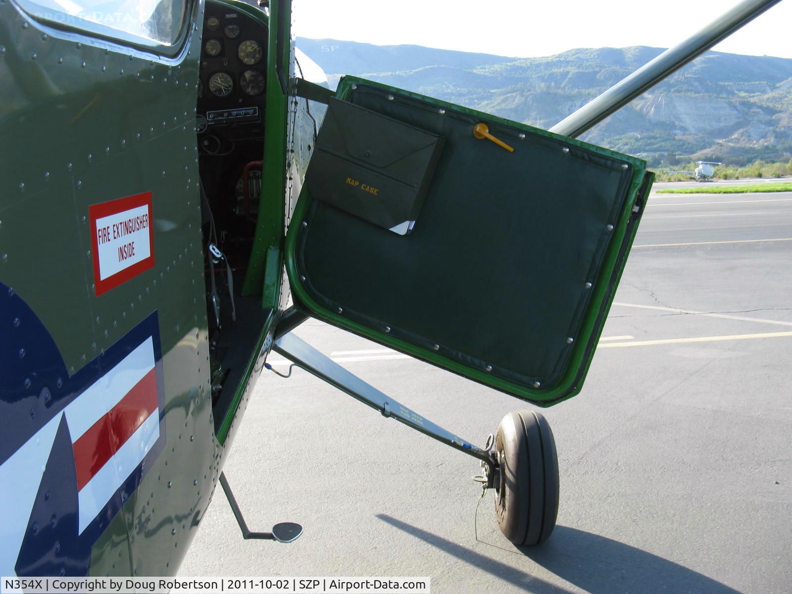 N354X, 1957 Cessna L-19E Bird Dog C/N 24512, 1957 Cessna L-19E BIRD DOG, Continental O-470-11B 213 Hp, map case
