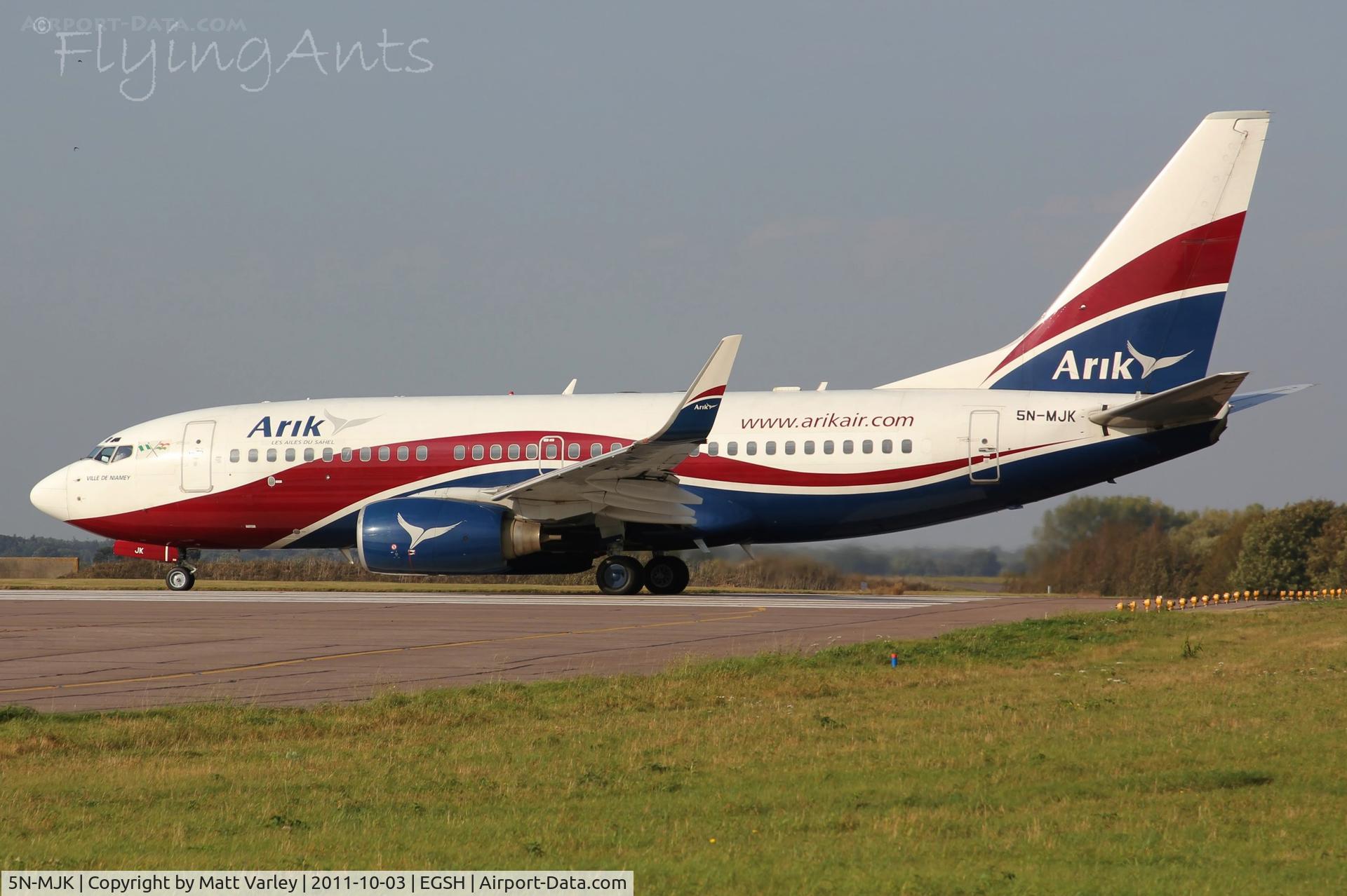 5N-MJK, 2001 Boeing 737-76N C/N 30830, departing EGSH after a week in engineering.