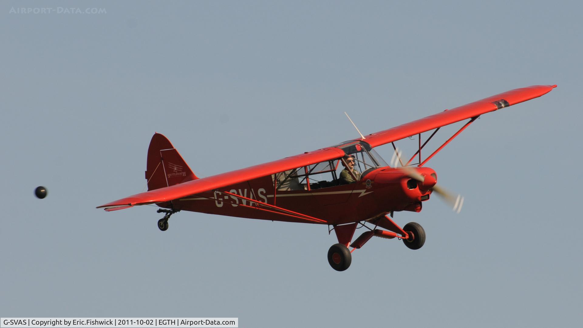 G-SVAS, 1961 Piper PA-18-150 Super Cub C/N 18-7605, 44. G-SVAS chasing ballons at Shuttleworth Autumn Air Display, October, 2011