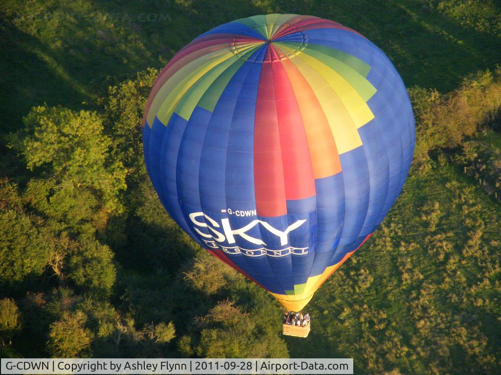 G-CDWN, 2006 UltraMagic N-210 C/N 210/33, Taken from G-AWFZ when flying inbound to Cranfield. The SKY hotair balloon is a regular sight around Milton Keynes. This photo was taken just west of Milton Keynes, Buckinghamshire.
