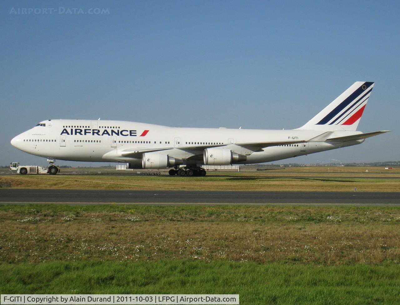 F-GITI, 2003 Boeing 747-428 C/N 32869, Coming under the light as the 1327th 747 built, Tango-India is also leased by ILFC.
