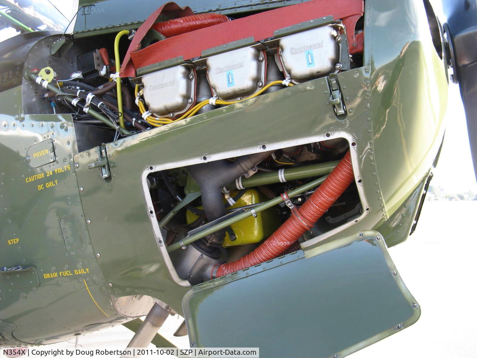 N354X, 1957 Cessna L-19E Bird Dog C/N 24512, 1957 Cessna L-19E BIRD DOG, Continental O-470-11B 213 Hp, engine oil tank is yellow/green reservoir sump