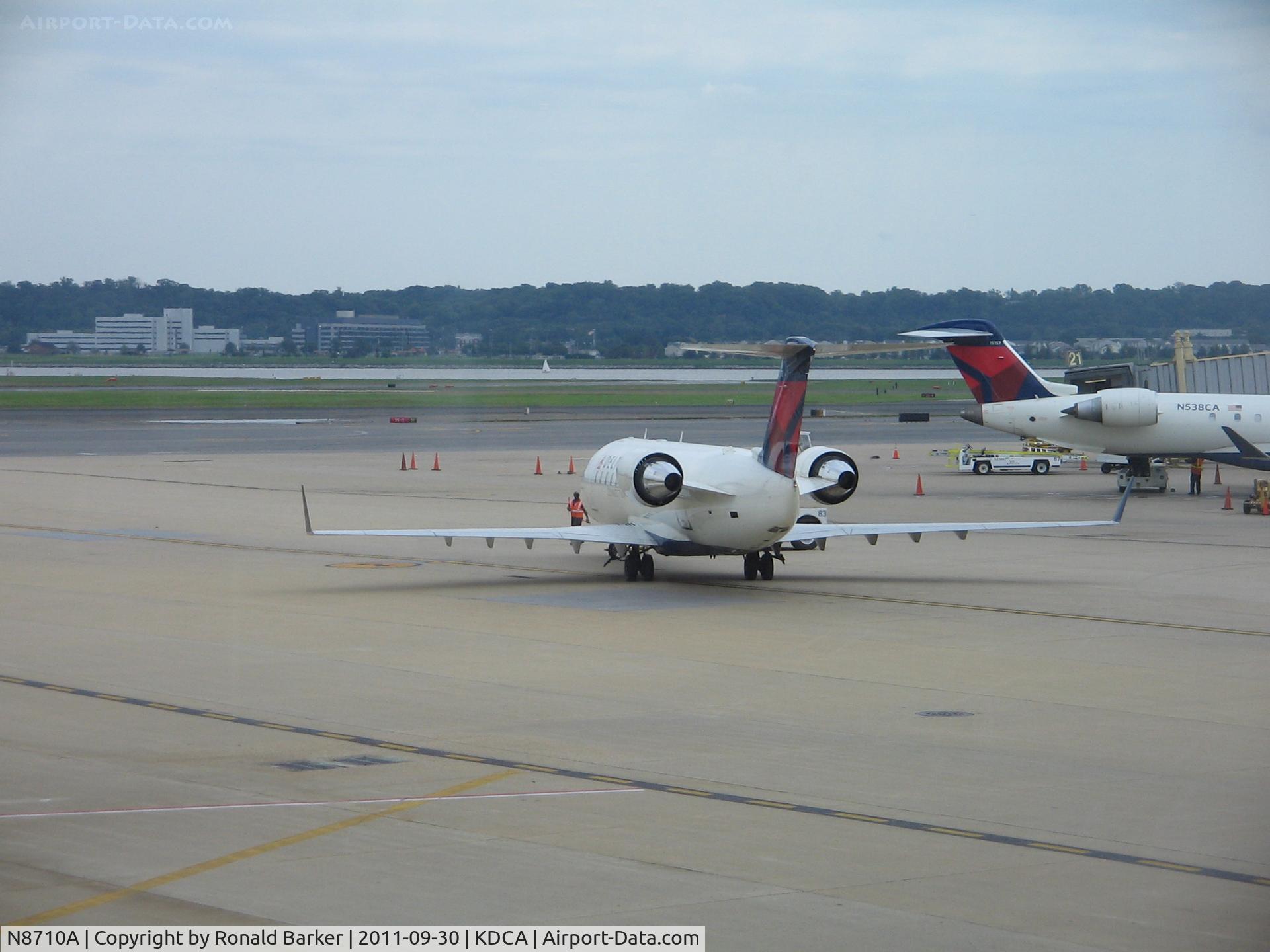N8710A, 2002 Bombardier CRJ-200 (CL-600-2B19) C/N 7710, DCA, VA