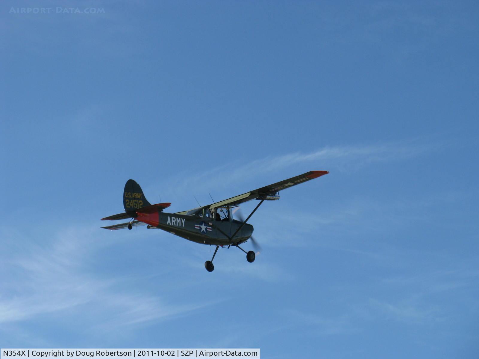 N354X, 1957 Cessna L-19E Bird Dog C/N 24512, 1957 Cessna L-19E BIRD DOG, Continental O-470-11B 213 Hp, STOL climbout with flaps Rwy 22. N354X is probably the finest, originally fully equipped L-19E regularly flying! By 1952 the Cessna L-19 had replaced most all other US made L aircraft.