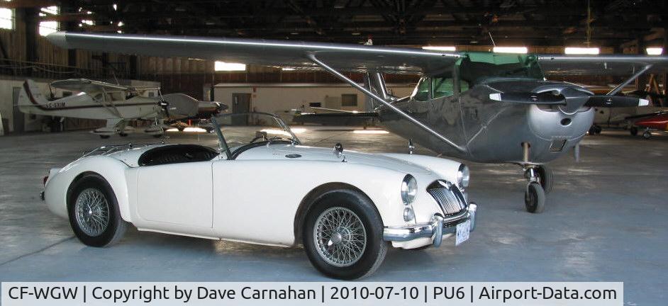 CF-WGW, 1967 Cessna 172H C/N 17256511, CF-WGW parked next to a 1961 MGA in hanger at Deseronto, Ontario