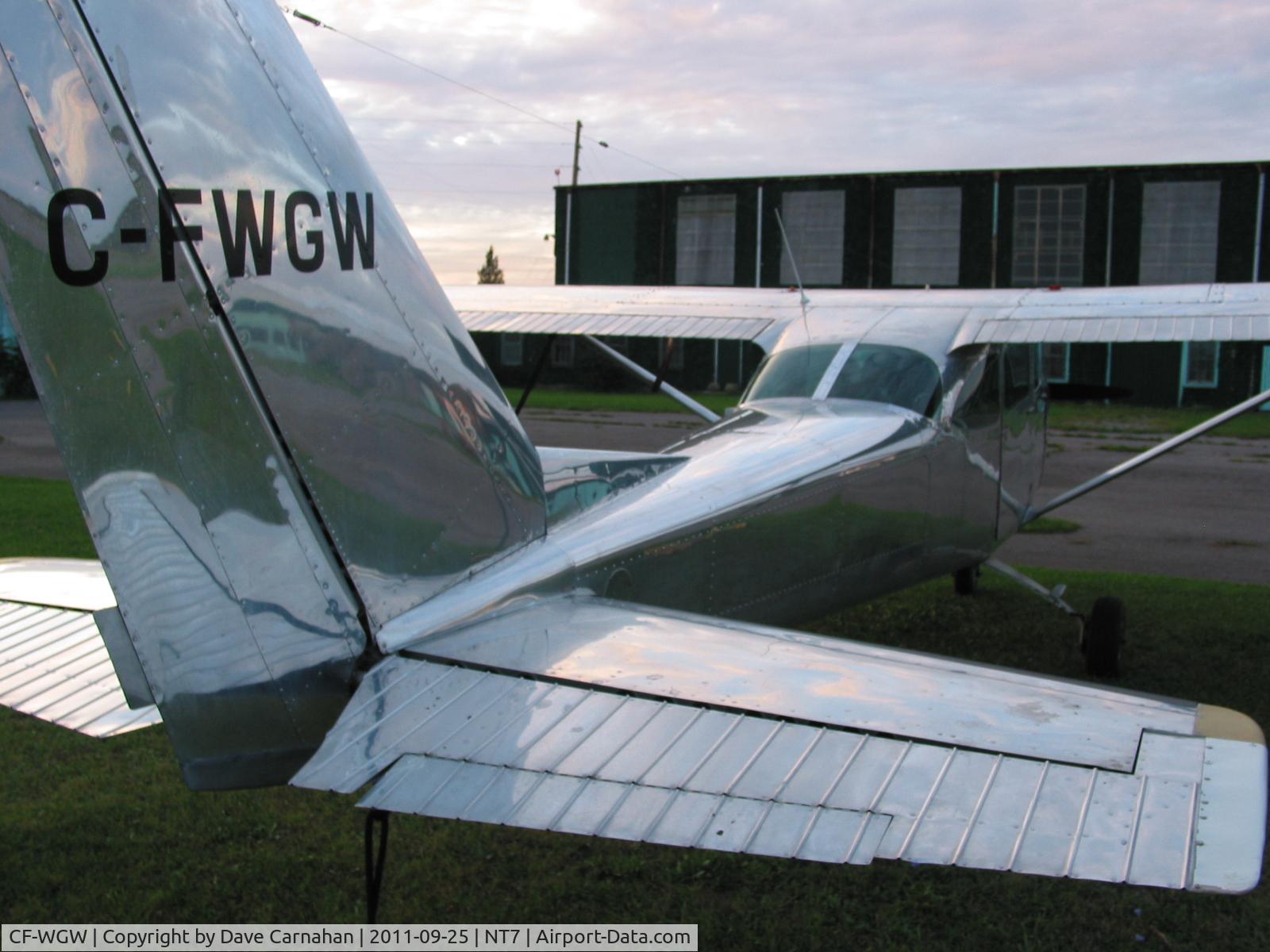 CF-WGW, 1967 Cessna 172H C/N 17256511, CF-WGW parked at Picton, Ontario. Aircraft paint has been stripped and is now polished aluminum.