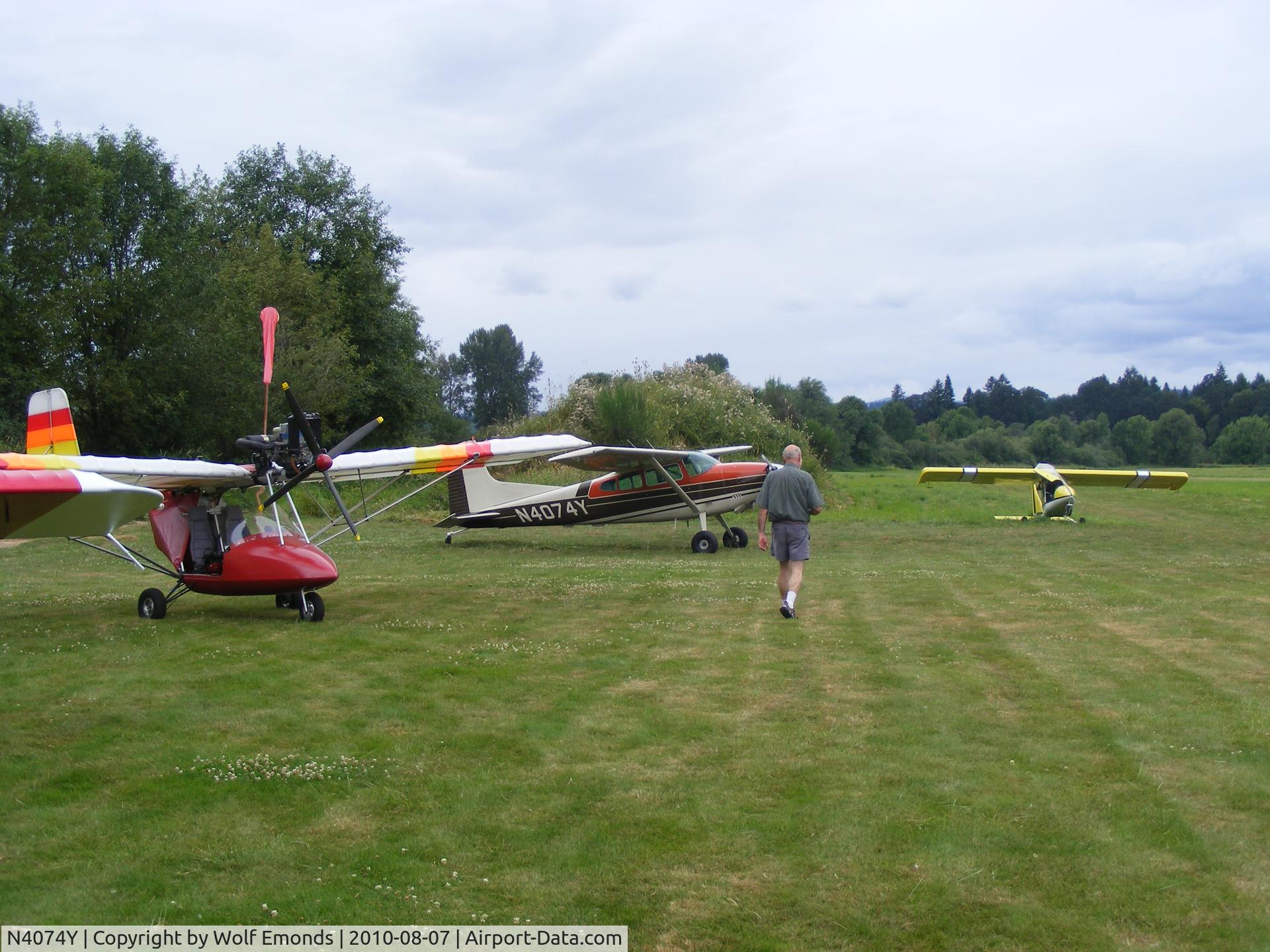 N4074Y, 1961 Cessna 185A Skywagon C/N 1850274, N4074Y at daybreak (corn patch) landing strip.